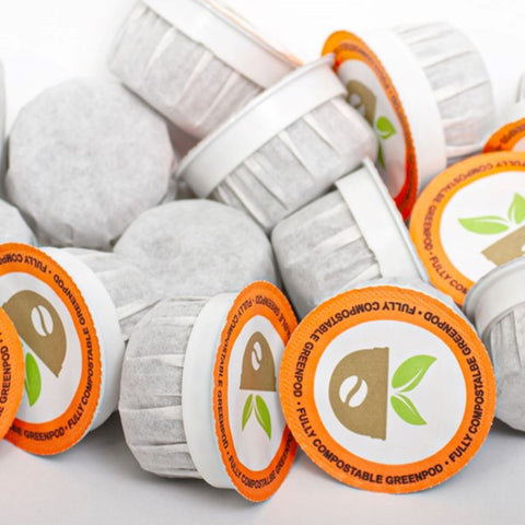 A stack of loose coffee pods.